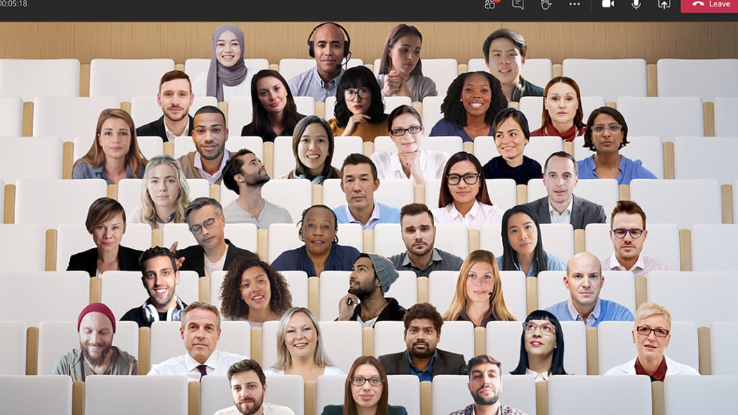 Teams Virtual Event with all colleagues on screen using a theatre auditorium background