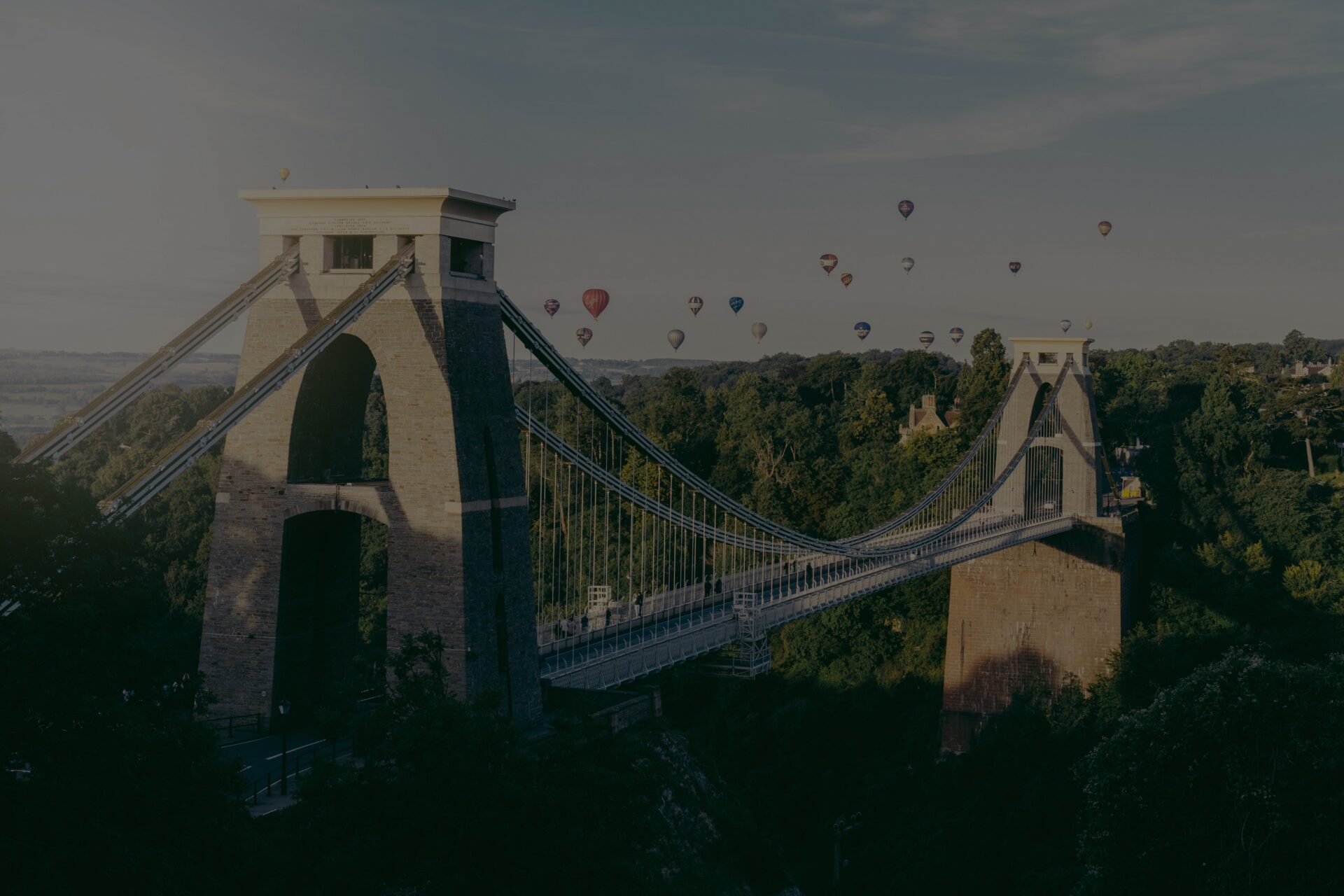 Clifton Suspension Bridge Clifton Suspension Bridge at Sunrise with a group of colourful hot air balloons in the background