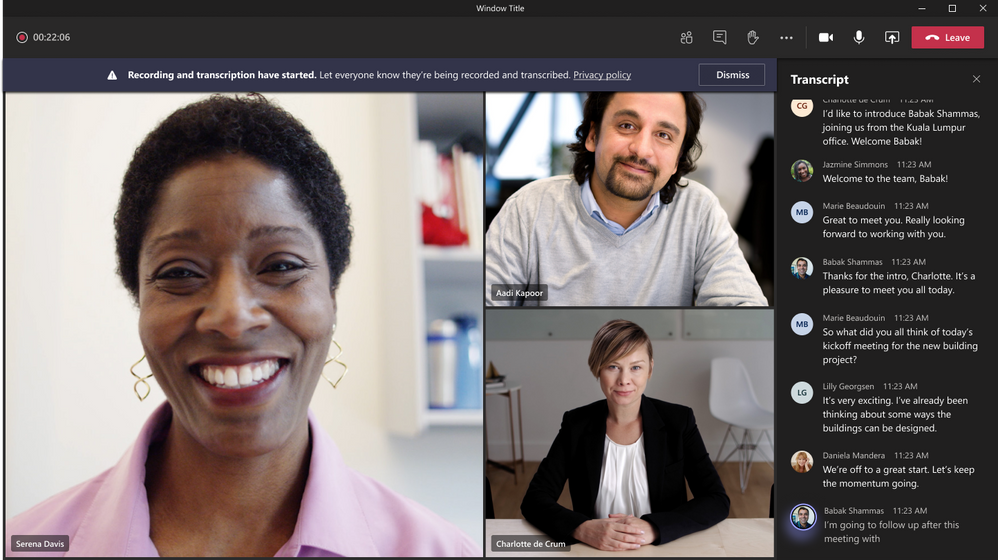 a screenshot of a teams call between three people with the transcription alongside the video feed